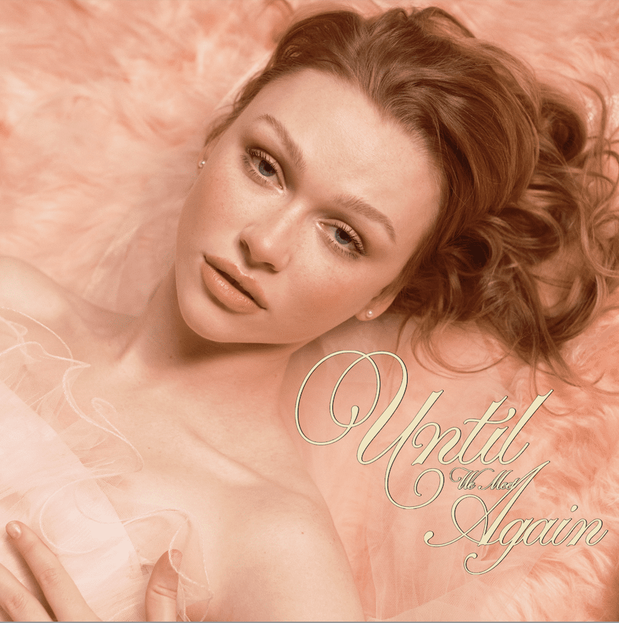 Close-up of a young woman with styled hair and soft makeup, lying on a pink fluffy surface, with the text 'Until We Meet Again' elegantly overlayed.