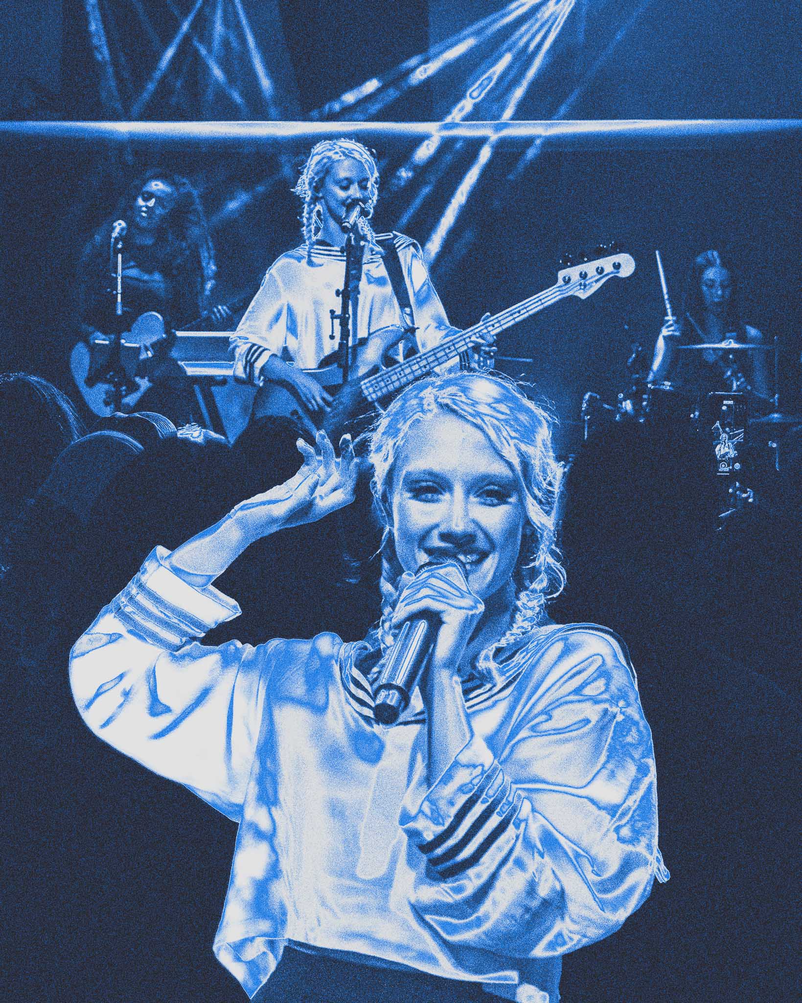 A vibrant concert scene featuring a performer on stage, singing into a microphone while engaging the audience, with a bassist and drummer in the background. The atmosphere is illuminated with blue lighting, creating an energetic and lively ambiance.