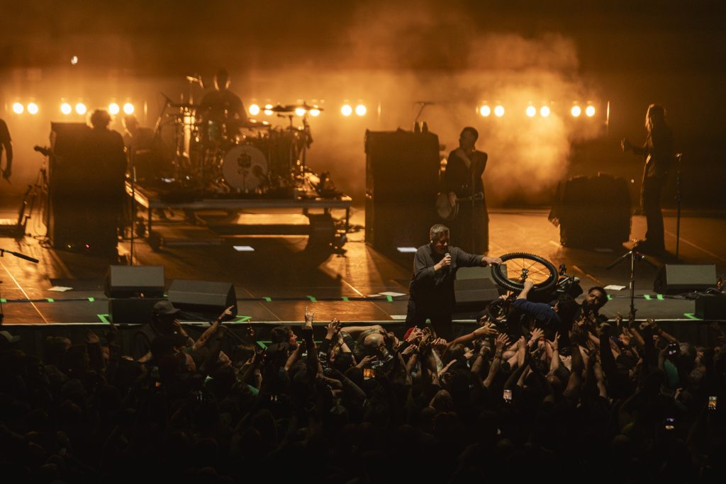 Ken Casey helps guide wheelchair crowd surfer at Dropkick Murphys Mission Ballroom Denver